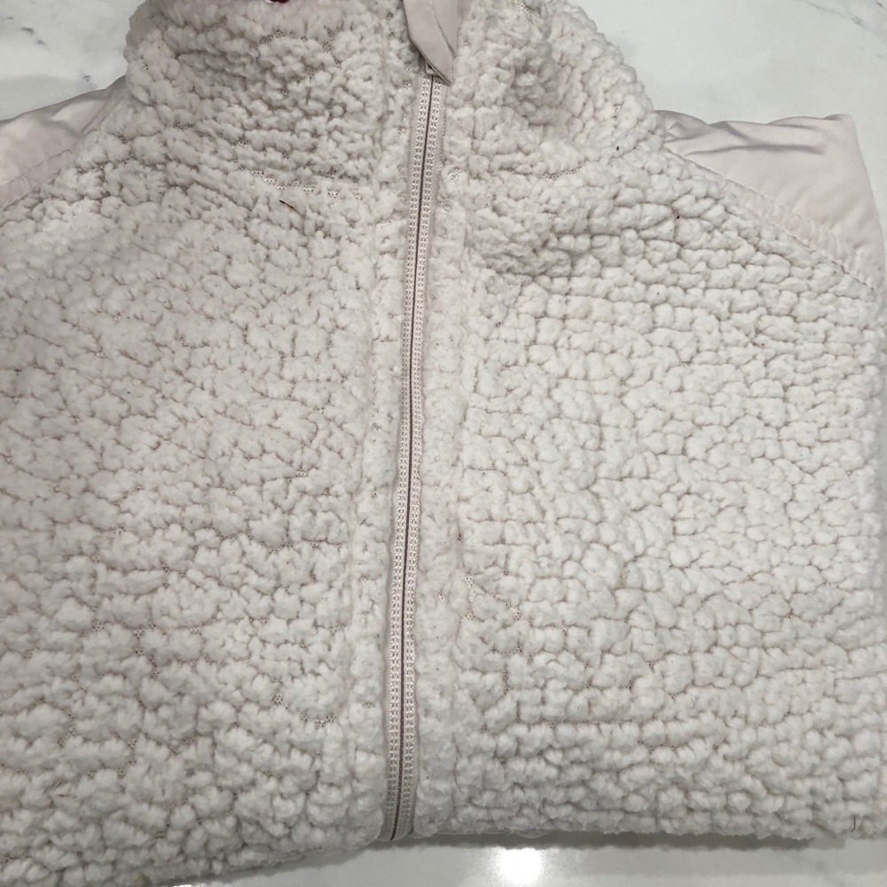 Warm, soft and cozy jacket . One spot on pocket .